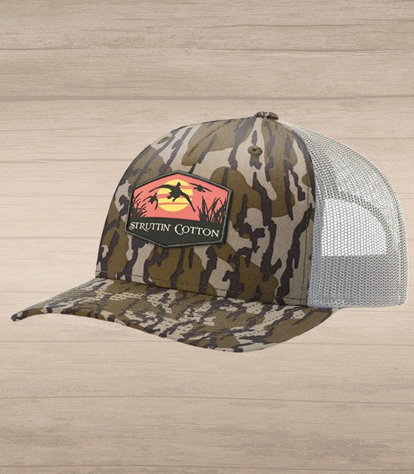 Evening Airshow Patch Snap Back Trucker Hat - Bottomlands Camo/Khaki-Struttin Cotton