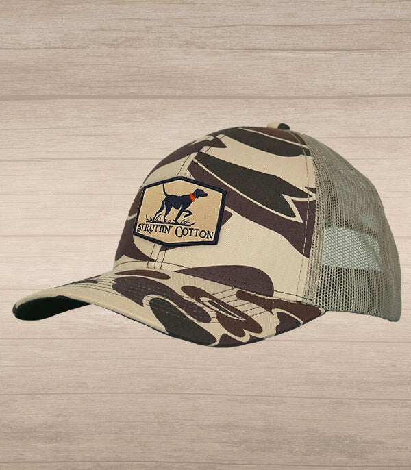 camo trucker hat with a dog patch